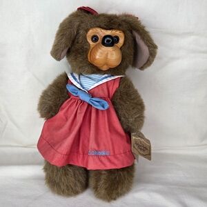Charming Plush Dog in Red Dress with Blue Bow